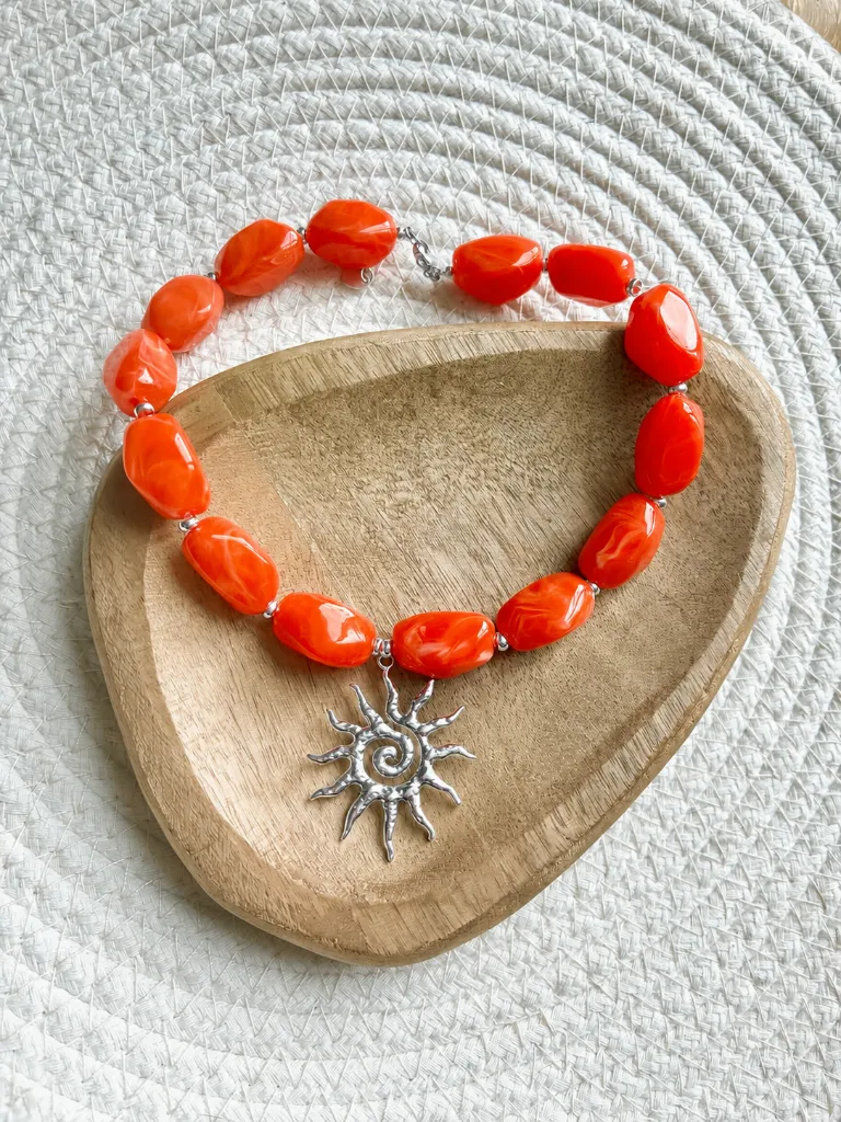 orange argent posé.webp